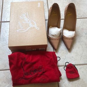 Christian Louboutin pumps.